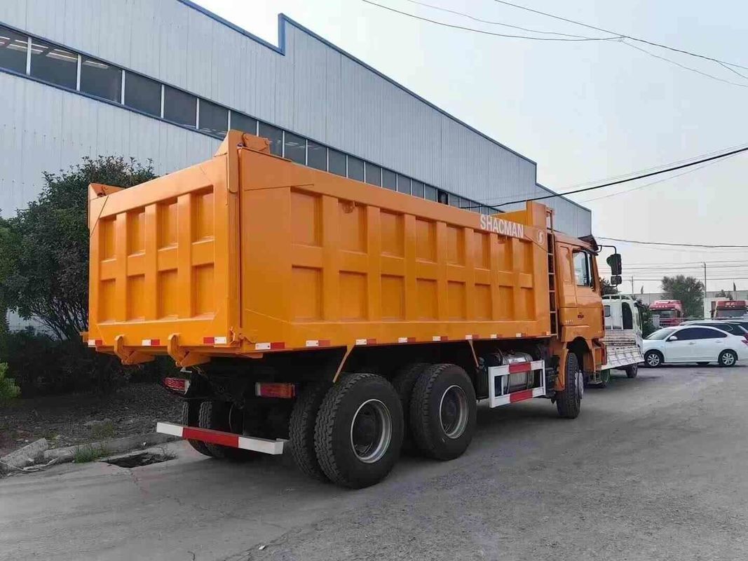 Camión pesado de neón rojo de 20 yardas cúbicas de capacidad MAN Sistema de mitigación de colisión del eje